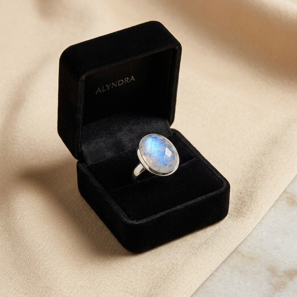 Luna Moonstone Ring presented in a black velvet jewelry box