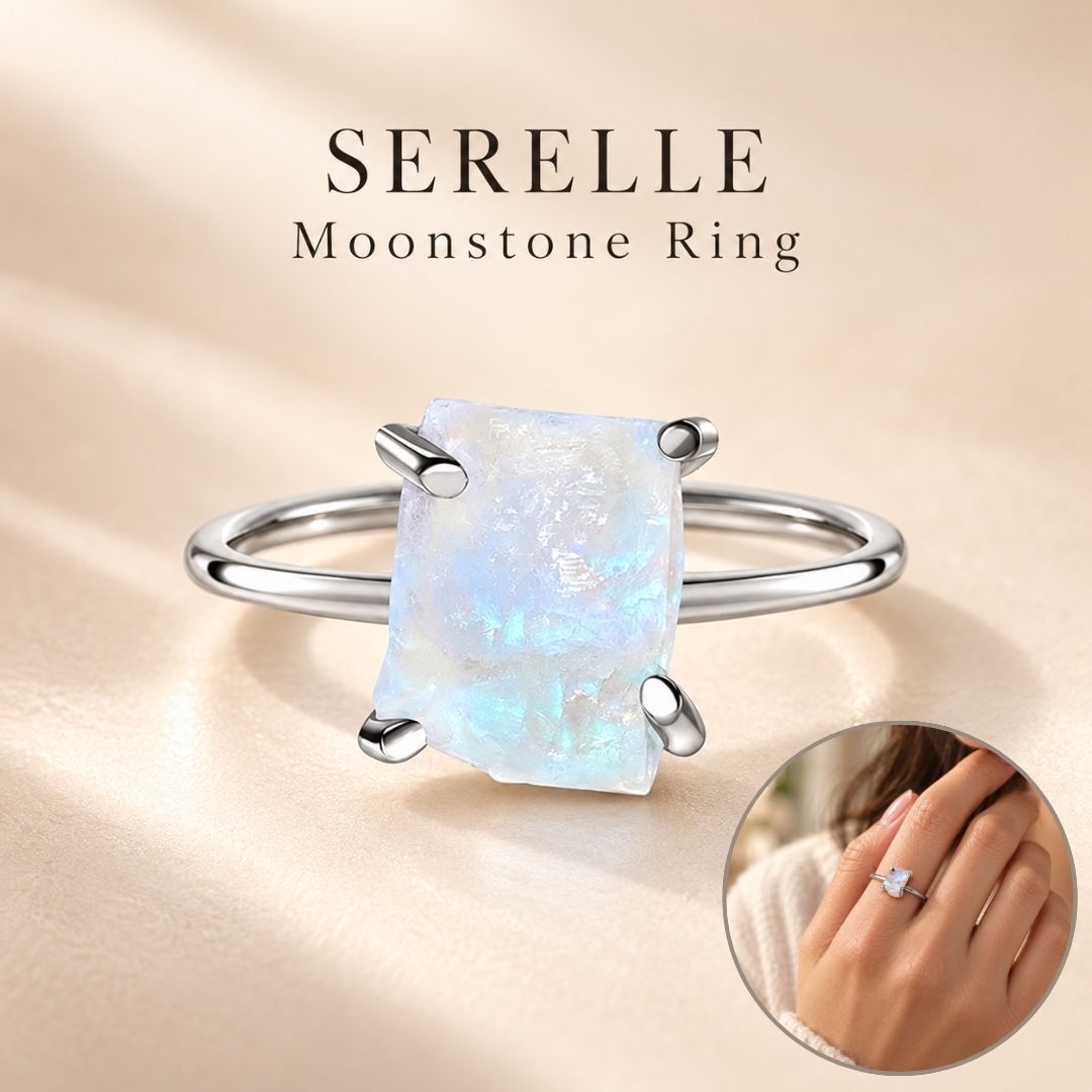 Serelle moonstone ring with luminous irregular moonstone and polished silver four-prong setting, shown with a lifestyle hand inset