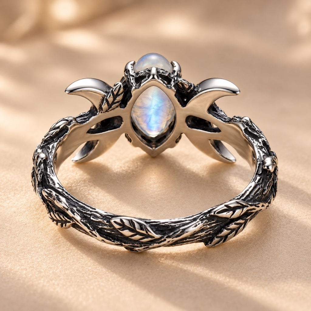 Veyra moonstone ring showing the detailed vintage silver band and crescent setting from the back