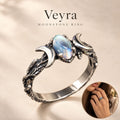 Veyra moonstone ring featuring a vintage crescent design and detailed silver band